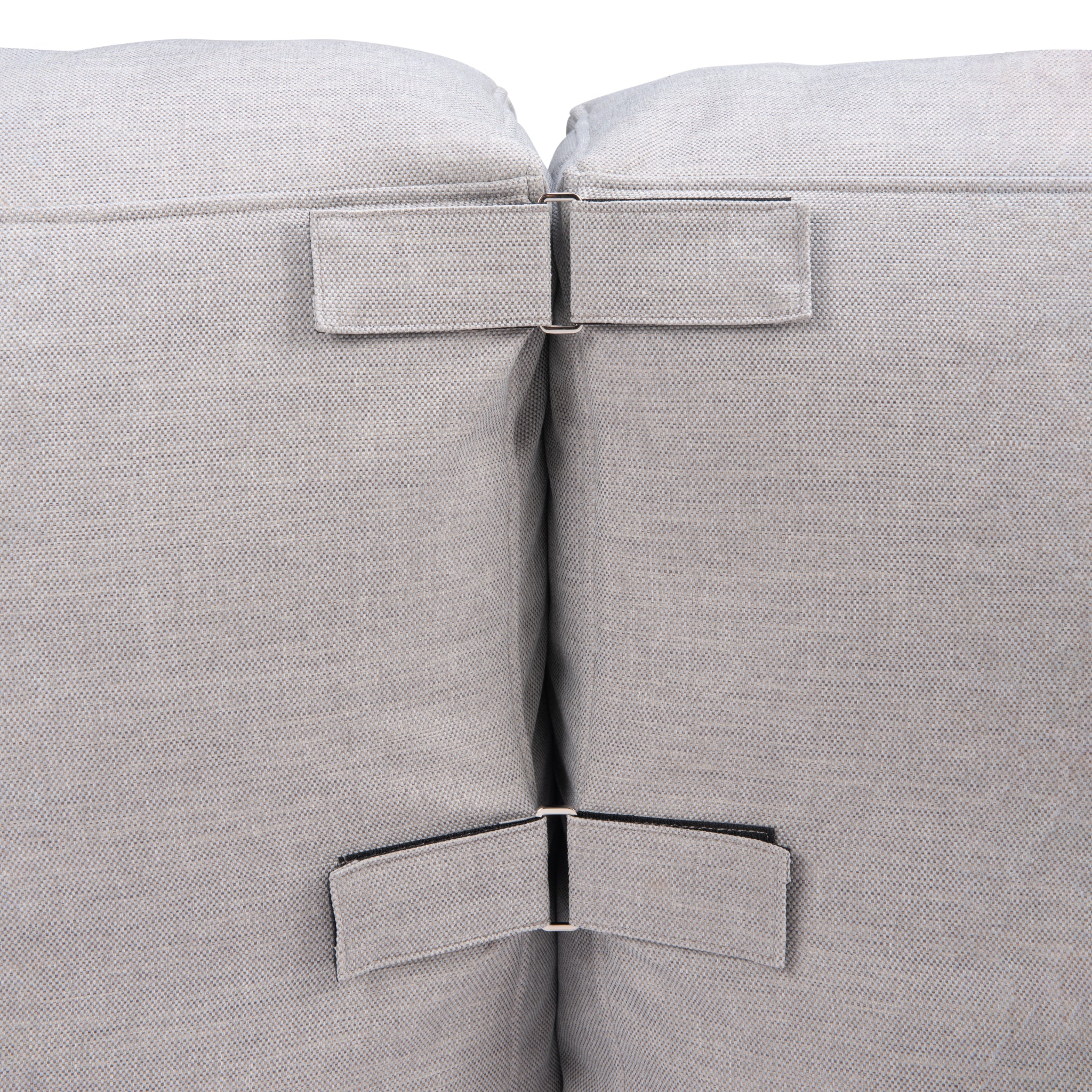 Detailed-view-of-gray-upholstered-couch-sections-joined-by-metal-clips---productpage---