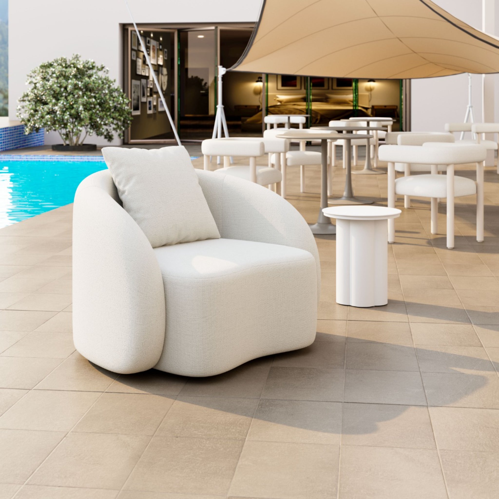 Poolside-patio-with-light-beige-chair-and-white-canopy-in-background---productpage---