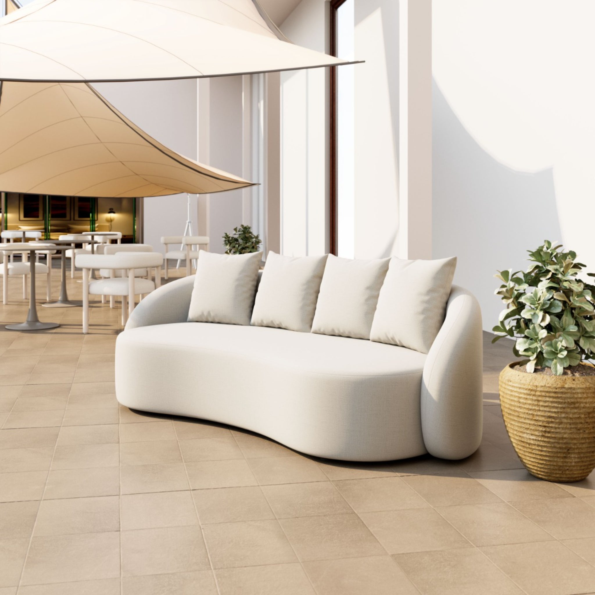 Modern-light-beige-sofa-with-four-cushions-on-outdoor-patio-near-potted-plant---productpage---