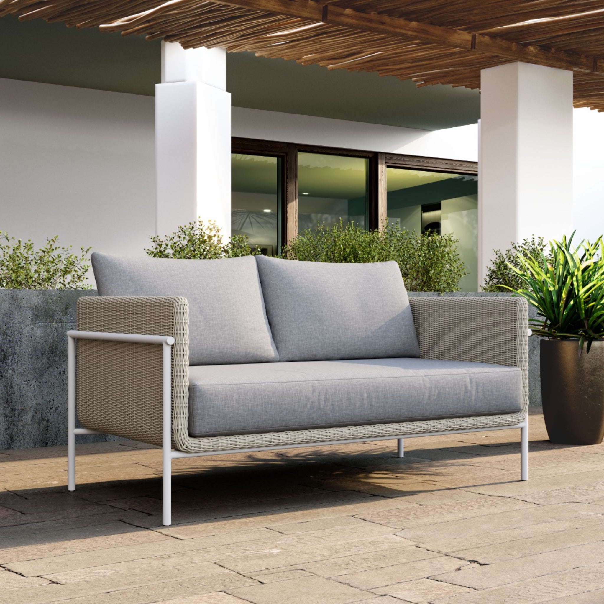 Modern-light-gray-outdoor-sofa-with-cushions-on-patio-with-wooden-pergola---productpage---