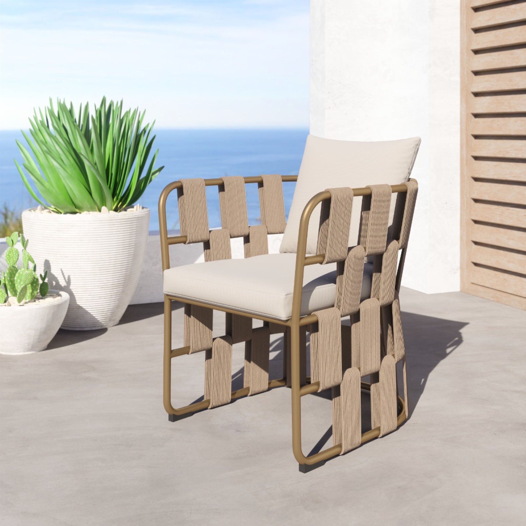 Outdoor-patio-chair-with-beige-cushions-and-woven-frame-overlooking-sea-view---productpage---