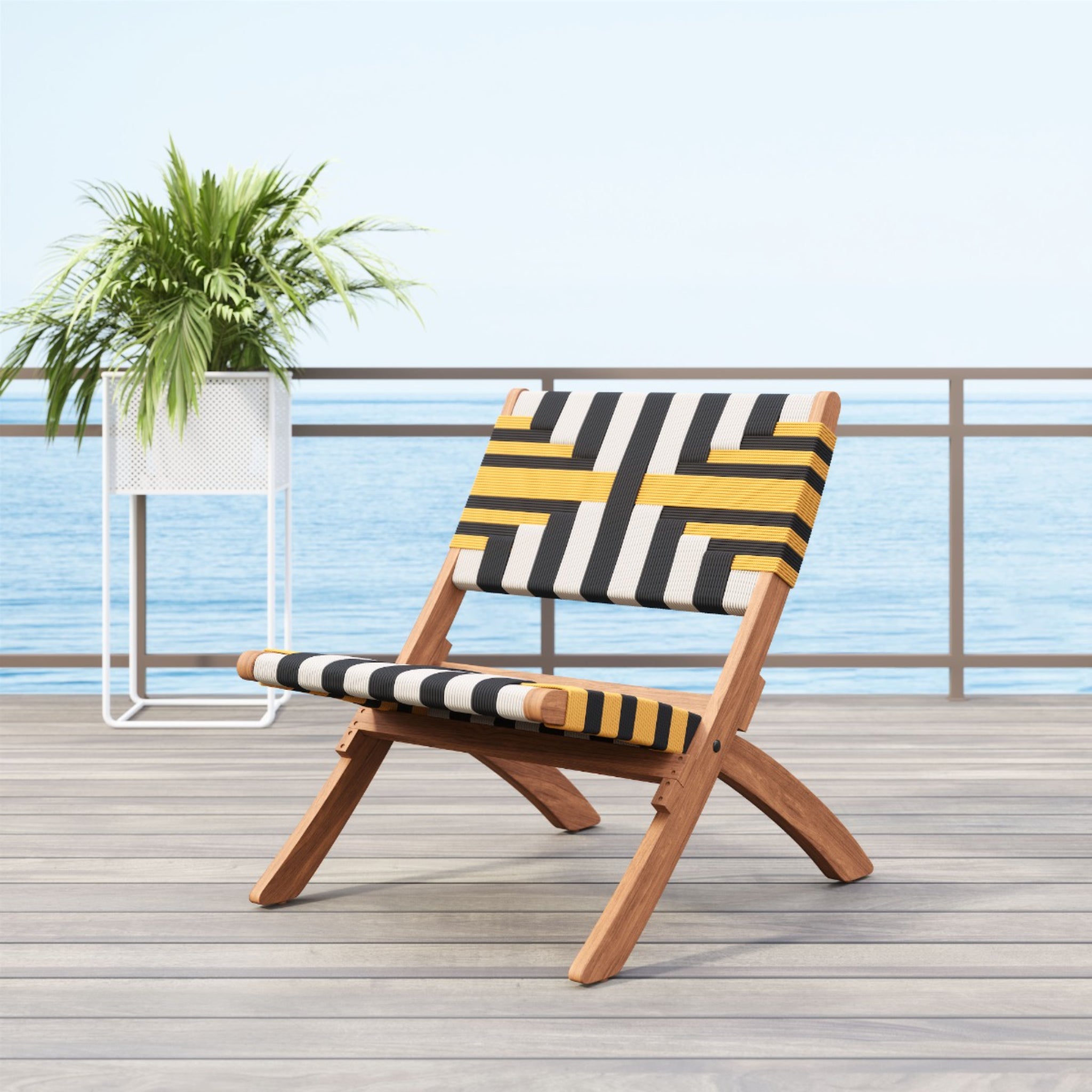 Seaside-setting-with-geometric-patterned-woven-chair-on-wooden-deck-and-ocean-view---productpage---